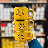 مج بورسلين اصفر مع وجوه رموز تعبيرية عليه