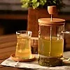 Herb Strainer Press - Enjoy herbal teas and quality coffee with this multifunctional press, which simplifies the process of creating rich flavors effortlessly.