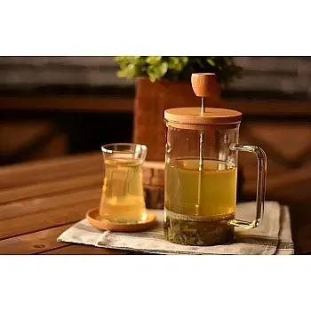 Herb Strainer Press - Enjoy herbal teas and quality coffee with this multifunctional press, which simplifies the process of creating rich flavors effortlessly.